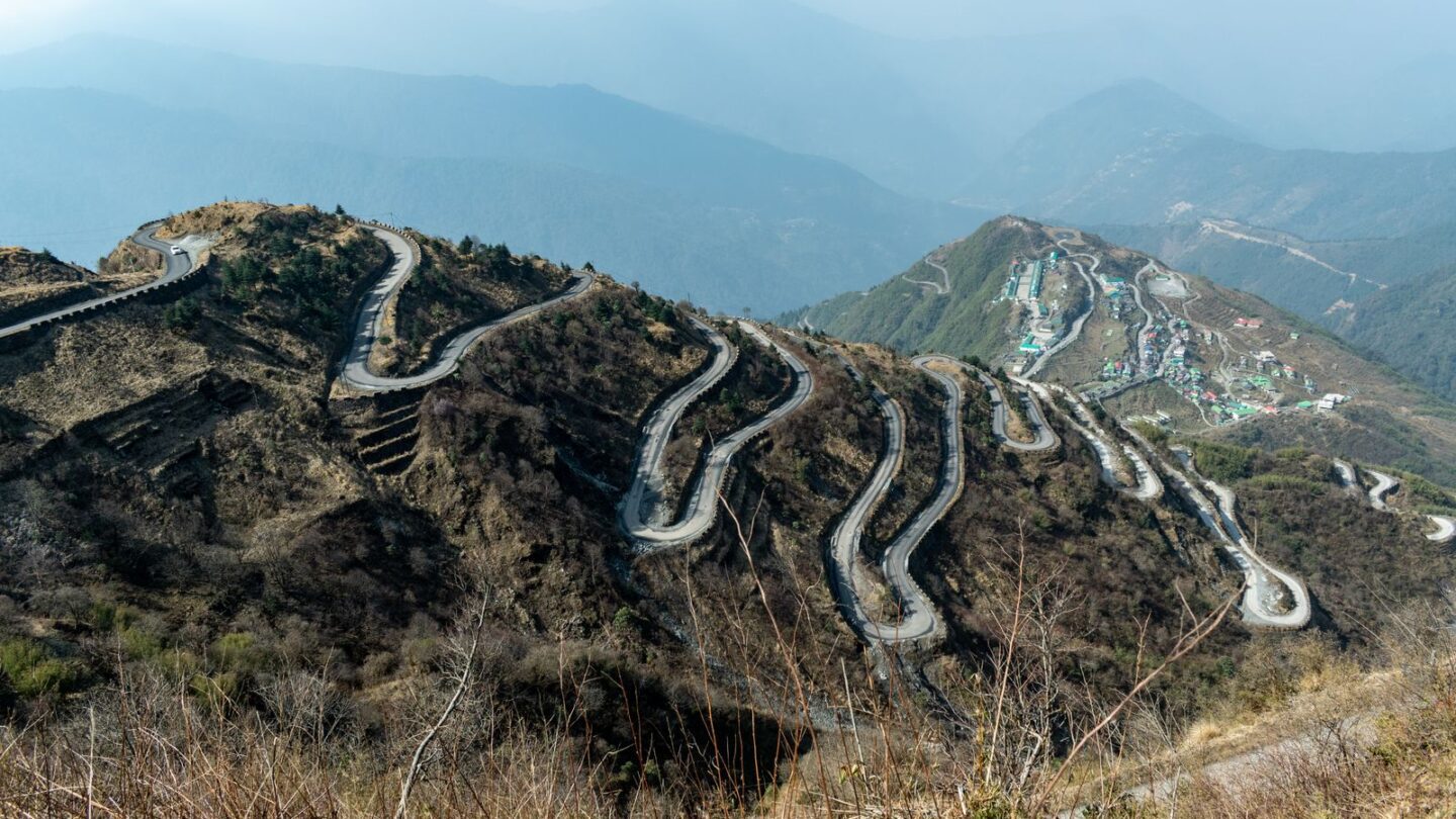 Serpentine hairpin road loops near Zuluk on the Old Silk Route in East Sikkim