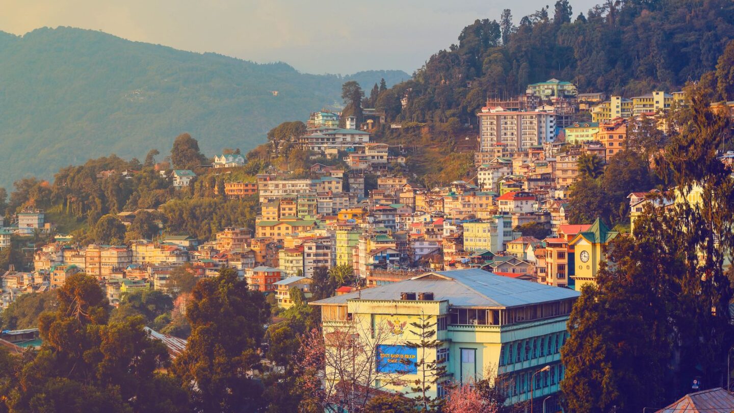 Aerial view of Gangtok at sunset, home to much of Sikkim famous food
